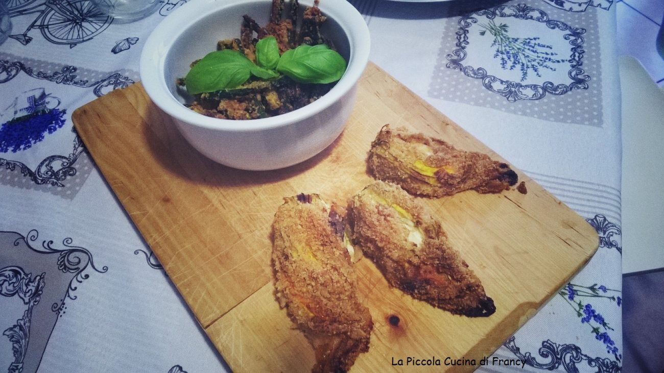 Fiori di zucca ripieni e le sue zucchine al forno